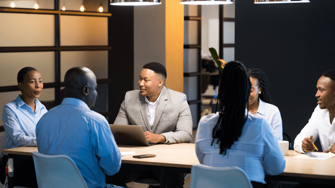 group of blacks in conference room , the tandem methods